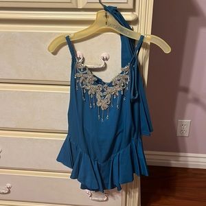 Vintage blue roller skating dress. Comes with sleeves .